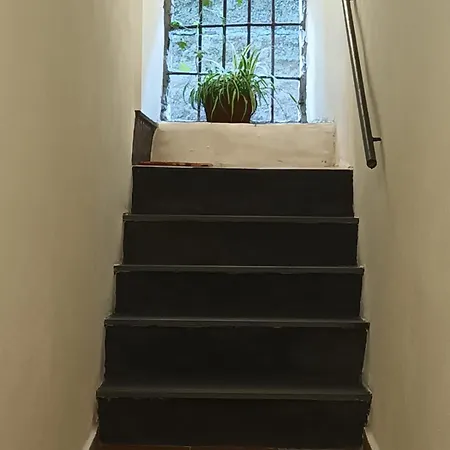 Menotti House *